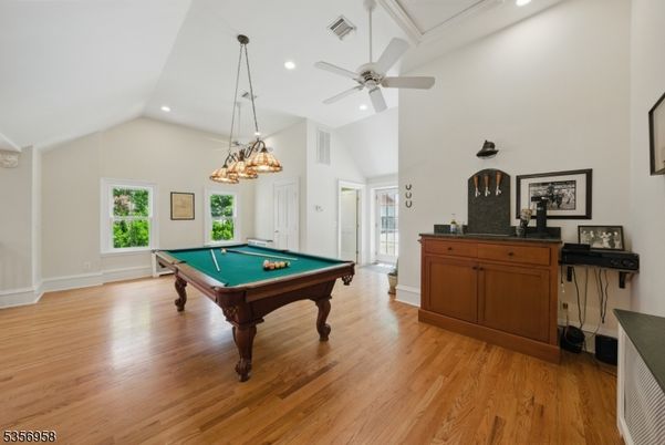 Billiard Table, Chandelier, Game Room, Interior, Pendant Lights, Recessed Lighting, Wood Texture Flooring