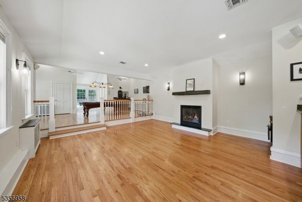 Fireplace, Interior, Pendant Lights, Recessed Lighting, Wood Texture Flooring