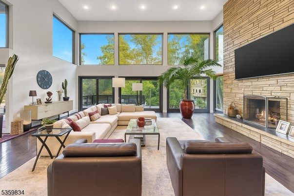 Fireplace, Interior, Living room, Recessed Lighting, Stone Walls, Wood Texture Flooring
