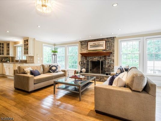 Fireplace, Interior, Living room, Recessed Lighting, Stone Walls, Wood Texture Flooring