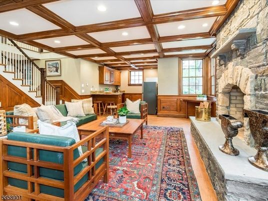 Fireplace, Interior, Living room, Recessed Lighting, Stone Walls, Wood Texture Flooring