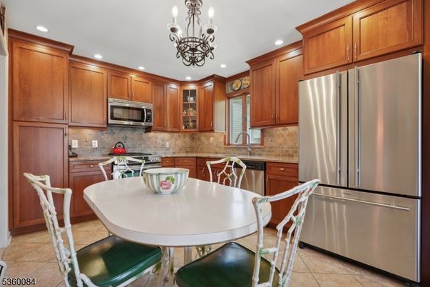 Chandelier, Dining room, Interior, Kitchen, Recessed Lighting, Stainless Steel Appliances