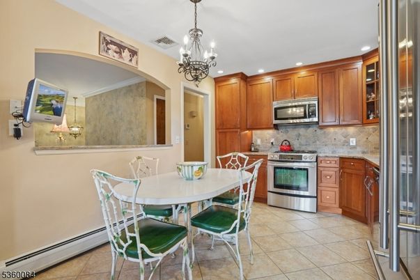 Dining room, Interior, Kitchen, Pendant Lights, Recessed Lighting, Stainless Steel Appliances