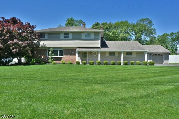 Attached, Backyard, Exterior, Facade, Brick Facade, Split Level