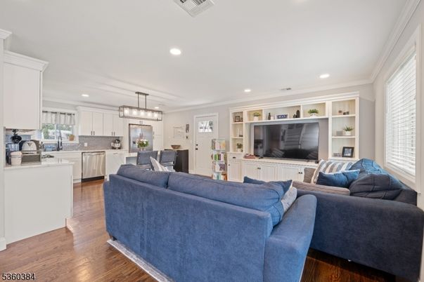 Dining room, Interior, Kitchen, Living room, Pendant Lights, Recessed Lighting, Stainless Steel Appliances, Wood Texture Flooring