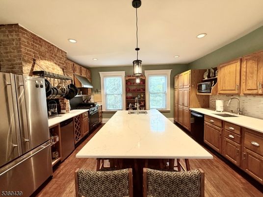 Interior, Kitchen, Pendant Lights, Recessed Lighting, Stainless Steel Appliances, Stone Walls, Wood Texture Flooring