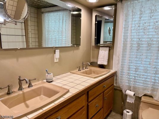 Bathroom, Dual Sink Vanities, Interior, Recessed Lighting, Tile Countertops