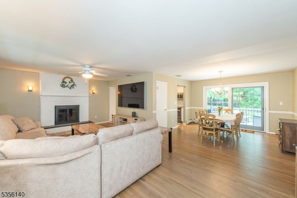 Chandelier, Dining room, Fireplace, Interior, Living room, Wood Texture Flooring