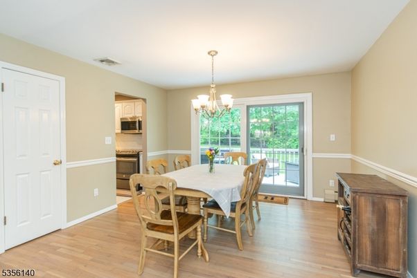 Chandelier, Dining room, Interior, Wood Texture Flooring