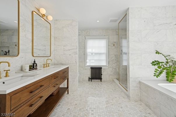 Bathroom, Dual Sink Vanities, Glass Shower, Interior, Marble Walls, Recessed Lighting