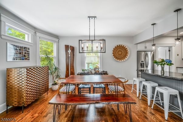 Dining room, Interior, Pendant Lights, Stainless Steel Appliances, Wood Texture Flooring