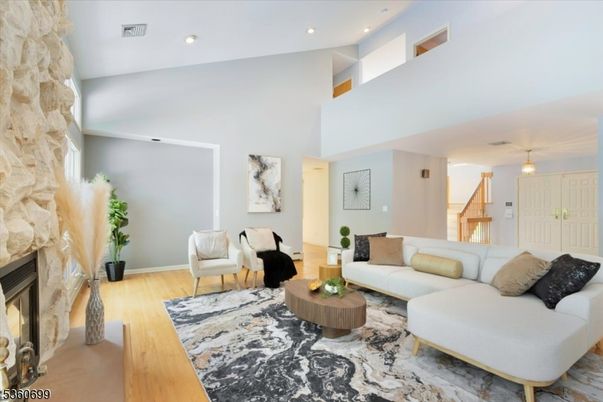 Fireplace, Interior, Living room, Pendant Lights, Recessed Lighting, Stone Walls, Wood Texture Flooring