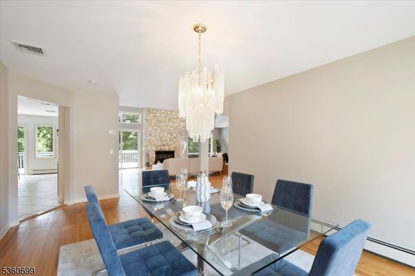 Chandelier, Dining room, Fireplace, Interior, Wood Texture Flooring