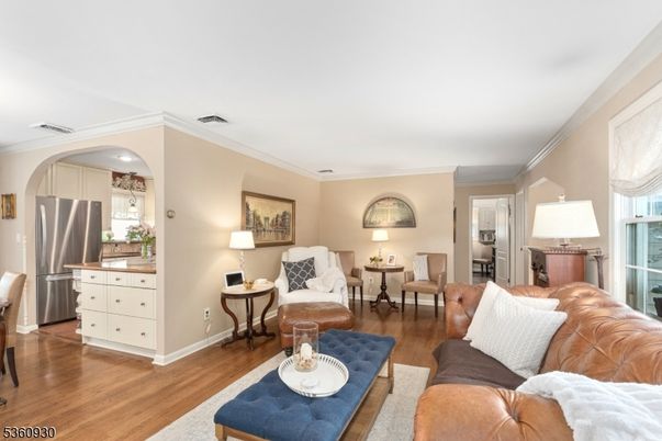 Dining room, Interior, Kitchen, Living room, Recessed Lighting, Stainless Steel Appliances, Wood Texture Flooring