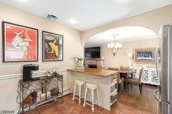 Chandelier, Dining room, Fireplace, Interior, Recessed Lighting, Wood Texture Flooring