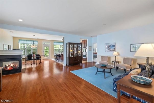 Dining room, Fireplace, Interior, Living room, Pendant Lights, Recessed Lighting, Wood Texture Flooring