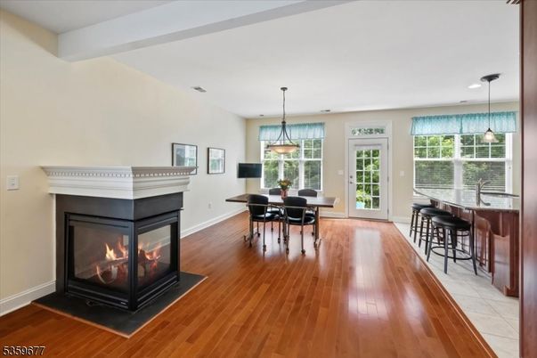 Dining room, Fireplace, Interior, Pendant Lights, Recessed Lighting, Wood Texture Flooring