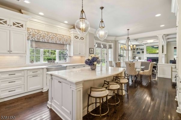 Chandelier, Dining room, Fireplace, Interior, Kitchen, Pendant Lights, Recessed Lighting, Wood Texture Flooring