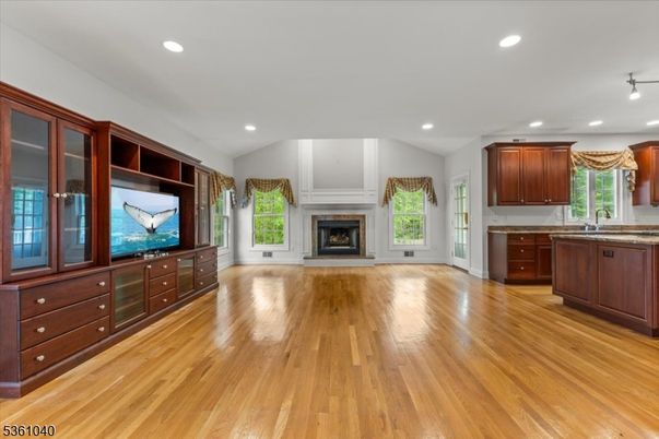 Empty room, Fireplace, Interior, Kitchen, Recessed Lighting, Wood Texture Flooring