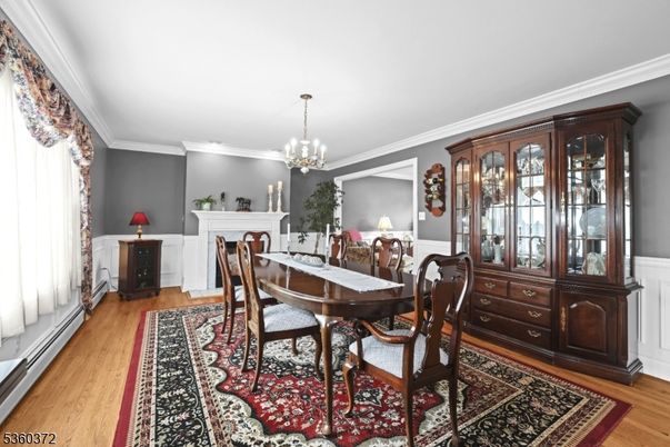 Chandelier, Dining room, Fireplace, Interior, Pendant Lights, Wood Texture Flooring