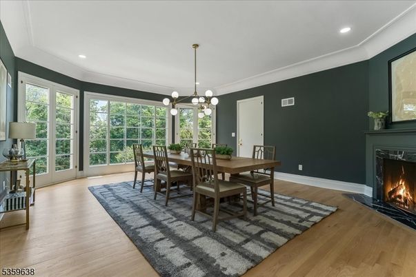 Dining room, Fireplace, Interior, Pendant Lights, Recessed Lighting, Wood Texture Flooring