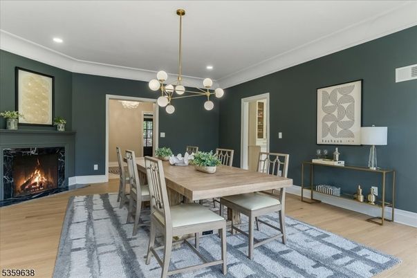 Dining room, Fireplace, Interior, Pendant Lights, Recessed Lighting, Wood Texture Flooring