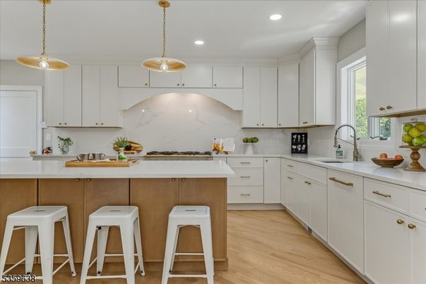 Interior, Kitchen, Marble Walls, Pendant Lights, Recessed Lighting, Wood Texture Flooring