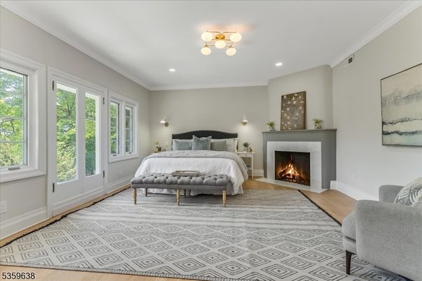 Bedroom, Fireplace, Interior, Recessed Lighting, Wood Texture Flooring