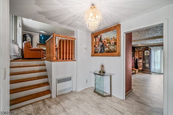 Chandelier, Interior, Marble, Recessed Lighting, Stone Walls, Wood Texture Flooring