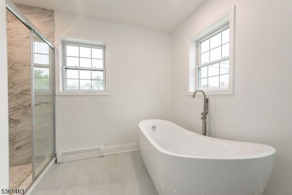 Bathroom, Free Standing Baths, Glass Shower, Interior, Marble, Marble Walls, Recessed Lighting