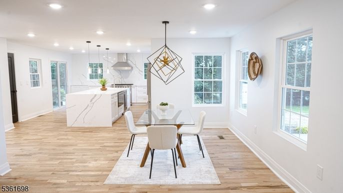 Dining room, Interior, Kitchen, Pendant Lights, Recessed Lighting, Stainless Steel Appliances, Wood Texture Flooring