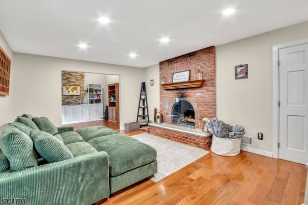 Fireplace, Interior, Recessed Lighting, Stone Walls, Wood Texture Flooring