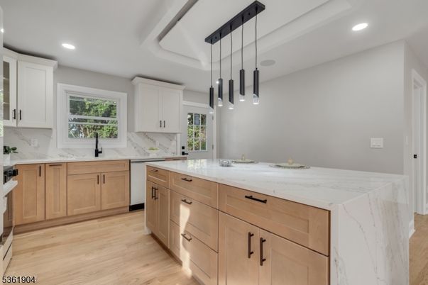Interior, Kitchen, Marble Walls, Pendant Lights, Recessed Lighting, Wood Texture Flooring