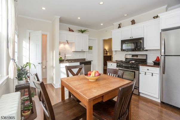 Dining room, Interior, Kitchen, Recessed Lighting, Stainless Steel Appliances, Wood Texture Flooring