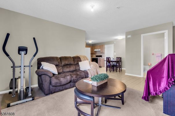 Dining room, Fitness Equipment, Interior, Kitchen, Living room, Stainless Steel Appliances