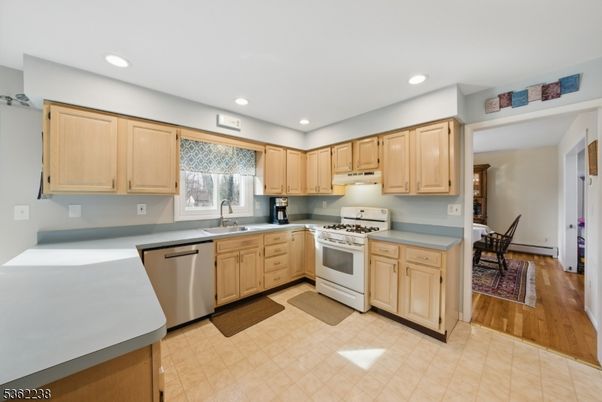 Dining room, Interior, Kitchen, Recessed Lighting, Stainless Steel Appliances, Wood Texture Flooring