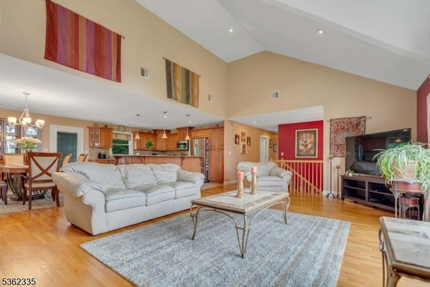 Dining room, Interior, Kitchen, Living room, Pendant Lights, Recessed Lighting, Stainless Steel Appliances, Wood Texture Flooring