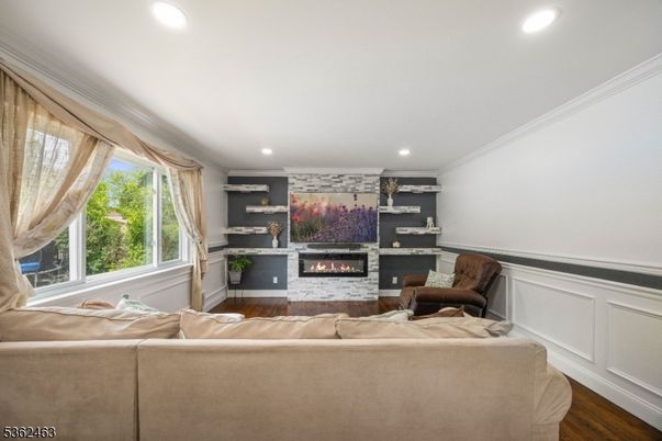 Fireplace, Interior, Living room, Recessed Lighting, Wood Texture Flooring