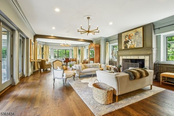 Dining room, Fireplace, Interior, Living room, Pendant Lights, Recessed Lighting, Wood Texture Flooring