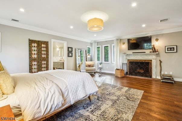 Bedroom, Fireplace, Interior, Recessed Lighting, Wood Texture Flooring