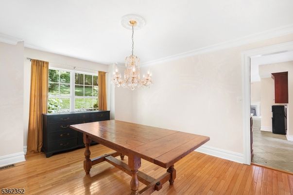 Chandelier, Dining room, Interior, Wood Texture Flooring