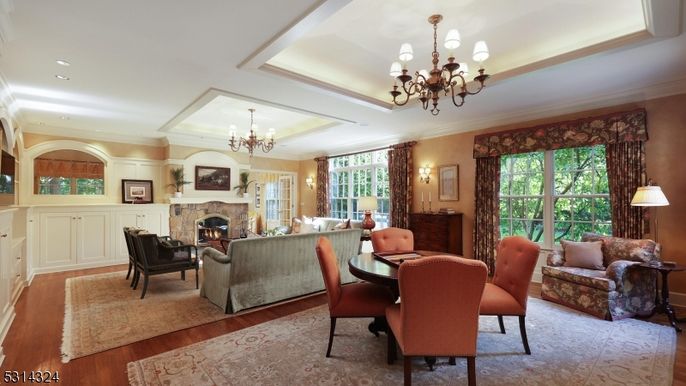 Chandelier, Dining room, Fireplace, Interior, Living room, Recessed Lighting, Wood Texture Flooring