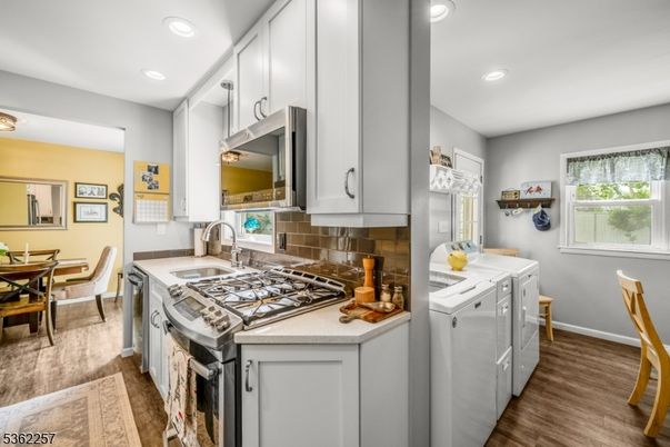 Dining room, Interior, Kitchen, Recessed Lighting, Washer, Wood Texture Flooring