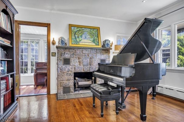 Fireplace, Interior, Piano, Recessed Lighting, Wood Texture Flooring