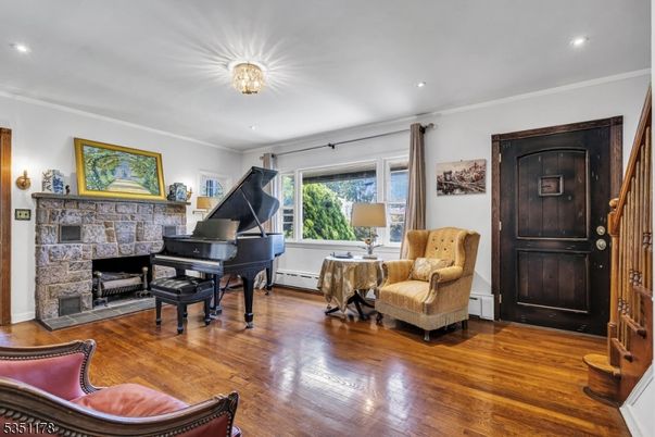 Fireplace, Interior, Piano, Recessed Lighting, Wood Texture Flooring