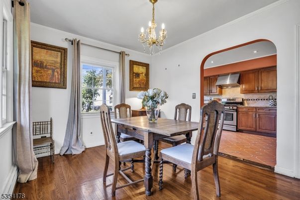 Chandelier, Dining room, Interior, Kitchen, Recessed Lighting, Stainless Steel Appliances, Wood Texture Flooring