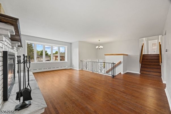 Chandelier, Fireplace, Interior, Wood Texture Flooring