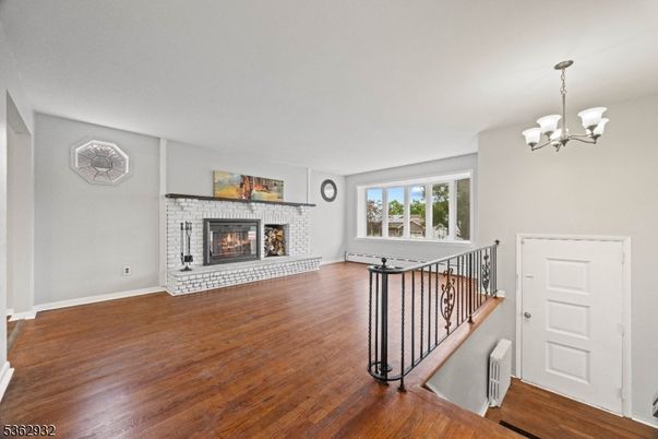 Chandelier, Fireplace, Interior, Wood Texture Flooring