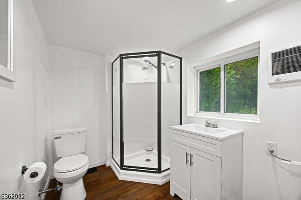 Bathroom, Glass Shower, Interior, Recessed Lighting, Wood Texture Flooring