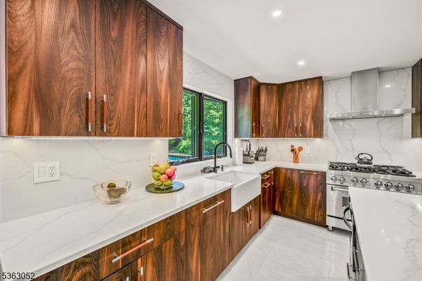 Interior, Kitchen, Marble Walls, Recessed Lighting, Stainless Steel Appliances